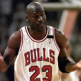 1992 FILE: The Chicago Bulls' Michael Jordan gives a shrug after sinking his sixth three-pointer during the game with Portland June 3, 1992, in Chicago. Jordan scored 35 points in the first half of the 122-89 victory over the Trailblazers in Game 1 of the NBA Finals. (Mike Blake/Reuters) ORG XMIT: SIN621R (basketball pro championship)